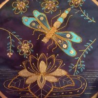 Blue Dragonfly Over Lily Ponds