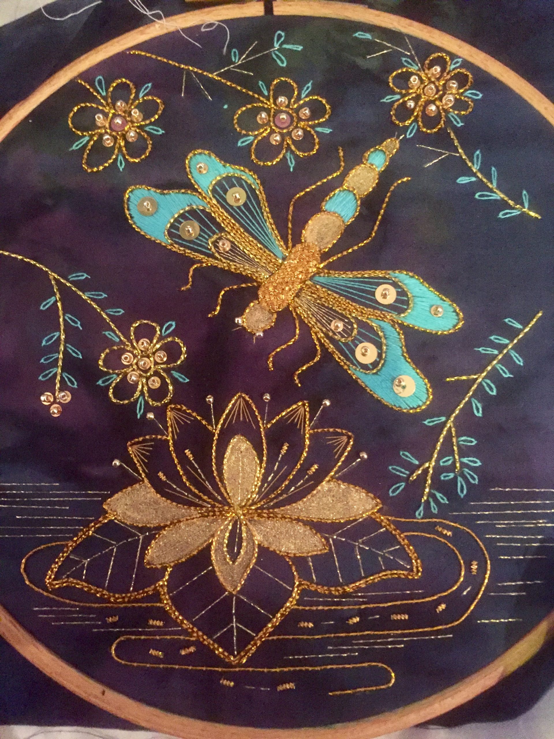 Blue Dragonfly Over Lily Ponds